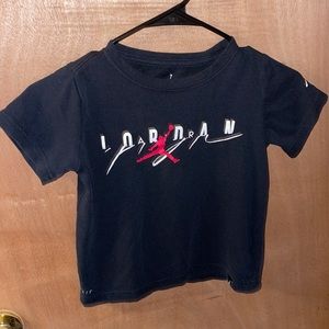 Jordan size 7 dry fit black T-shirts with a Jordan on the front